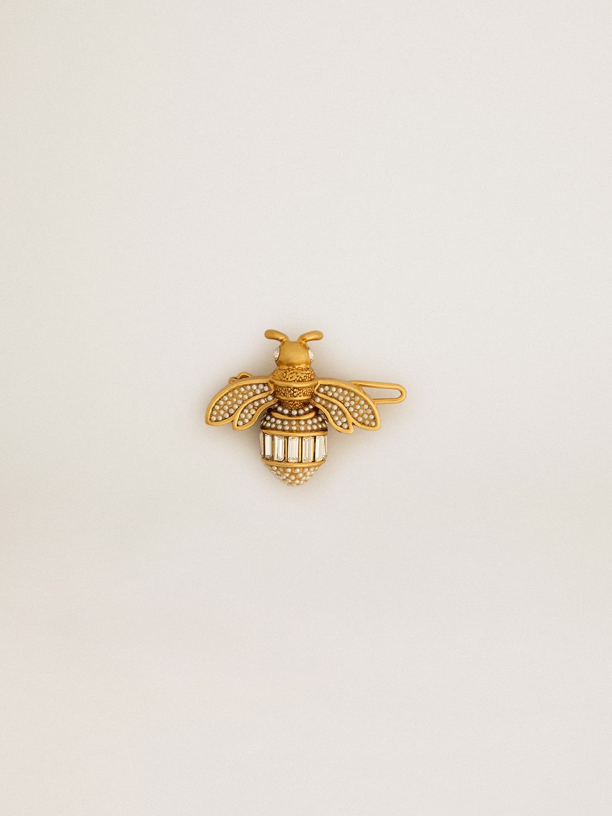 Bee-shaped lace tag in antique gold color with crystals