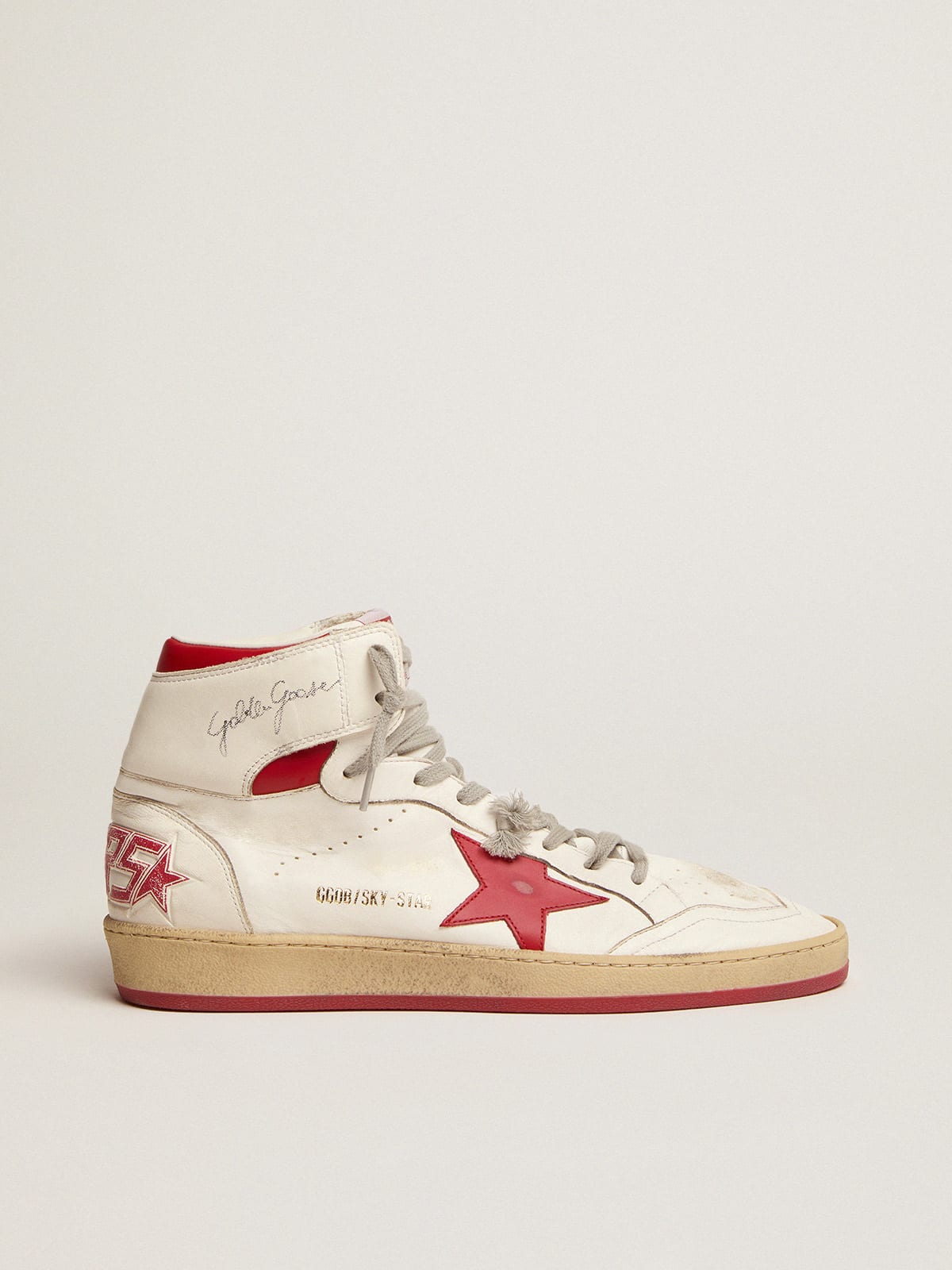 Sneaker Sky-Star in nappa bianca con stella e talloncino in pelle rossa