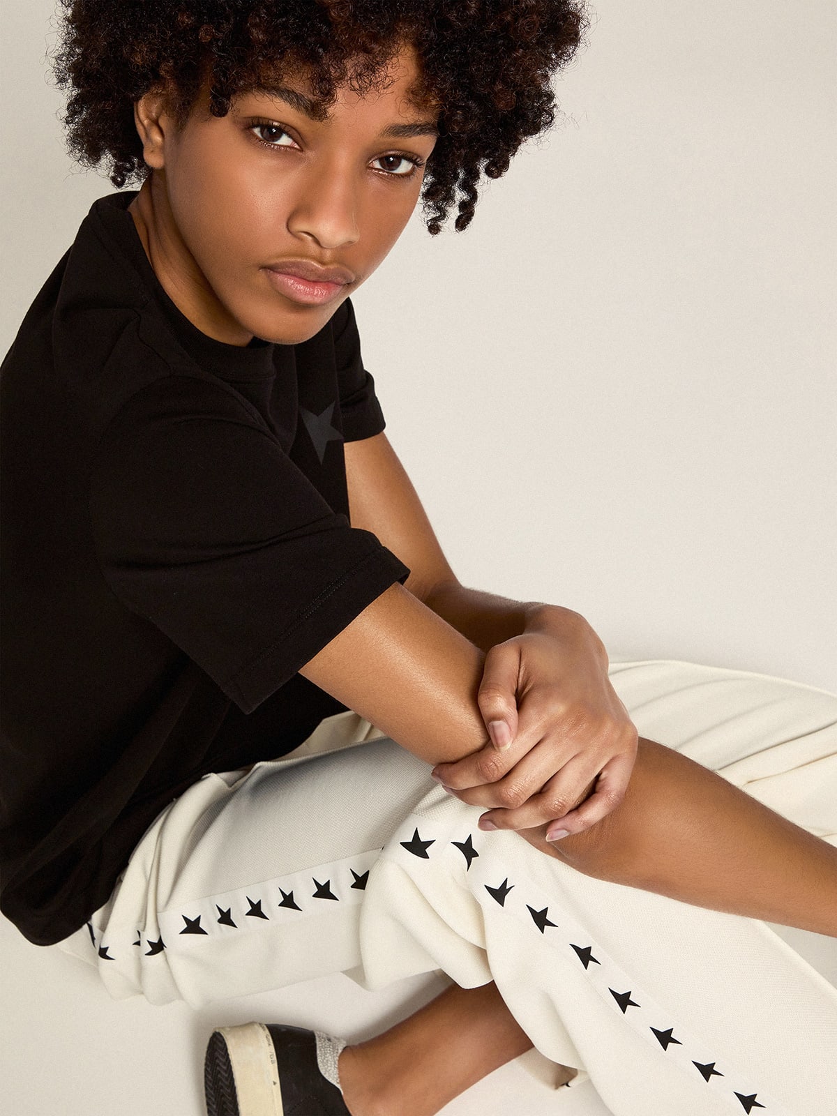 Pantalone jogging da donna di colore bianco con stelle sui lati
