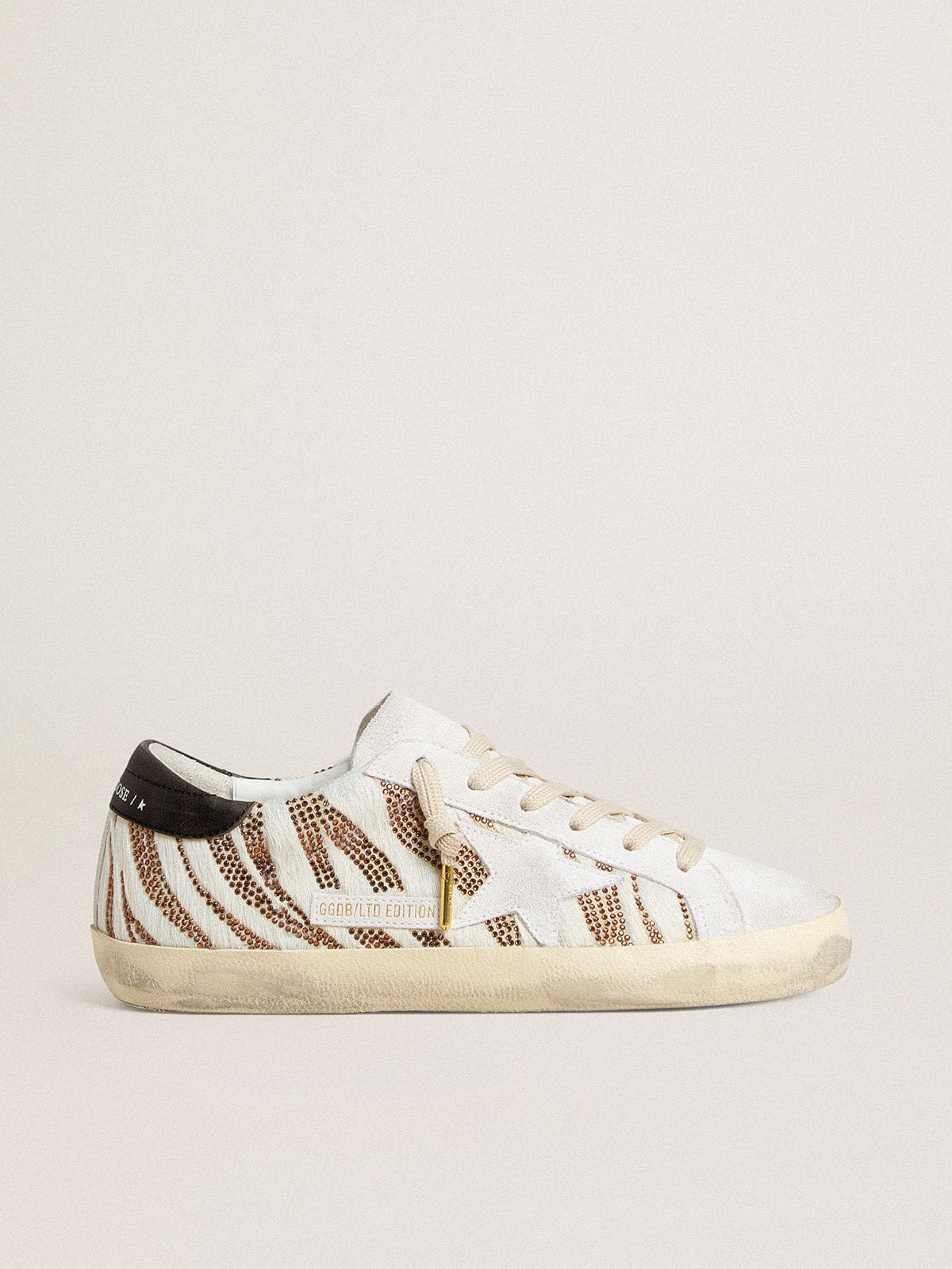 Women’s Super-Star LTD in white pony skin with brown glitter and white suede star