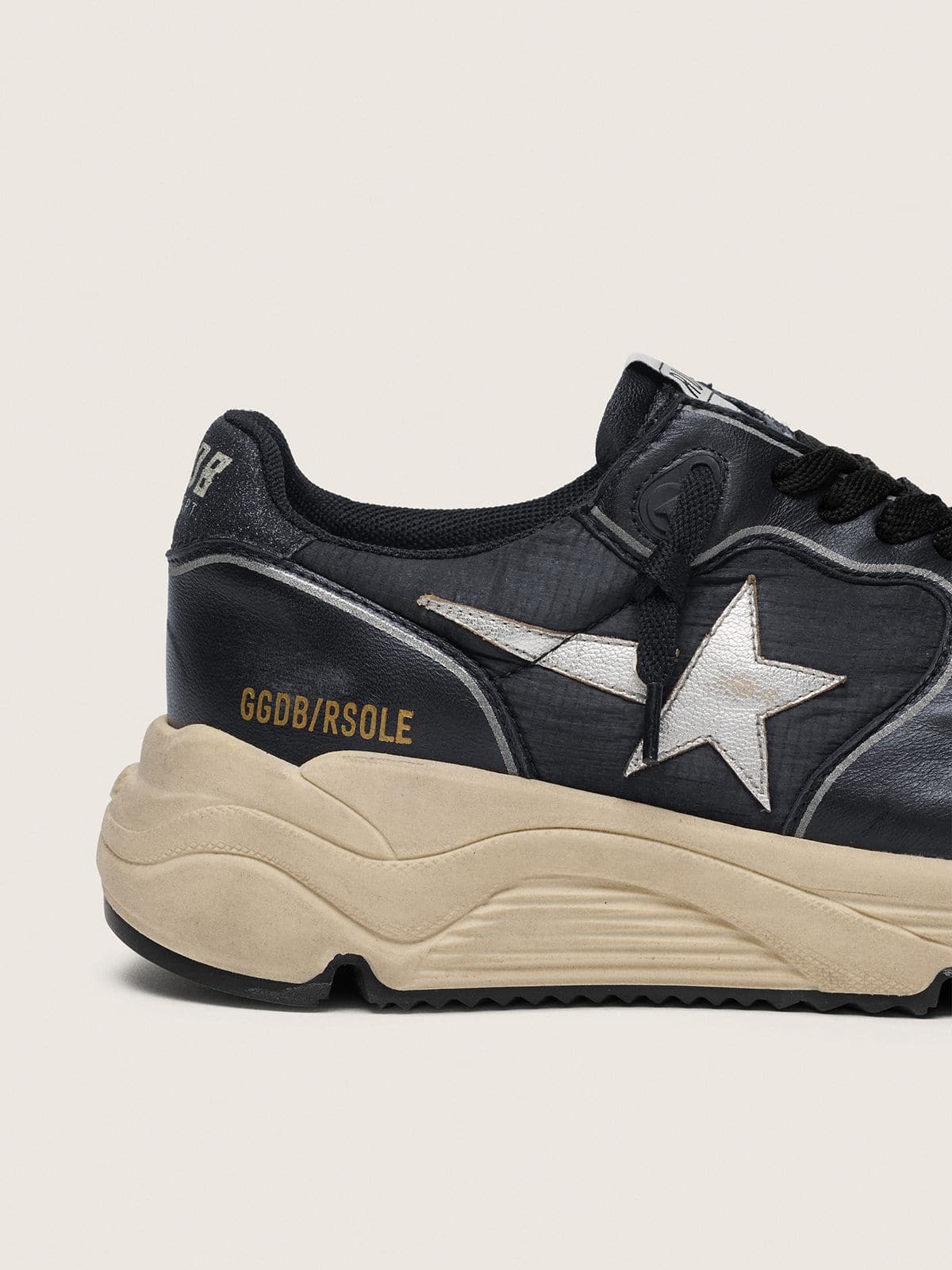 Women’s Running Sole in black nappa leather and nylon with a silver leather star