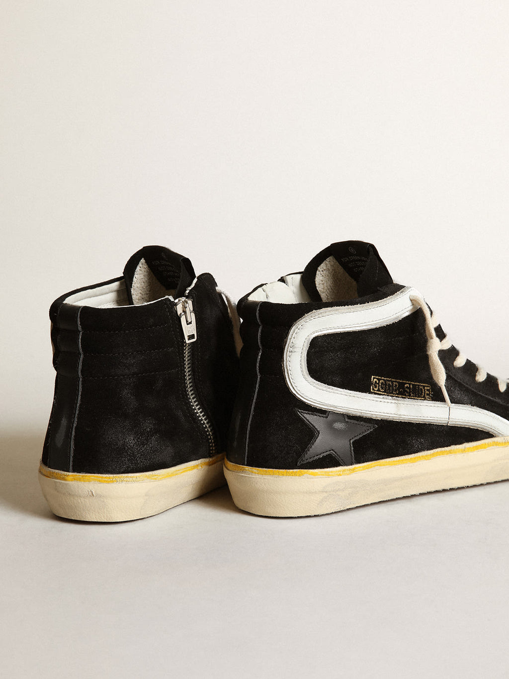 Sneaker Slide Penstar in suede nero con stella in pelle nera e virgola in pelle bianca