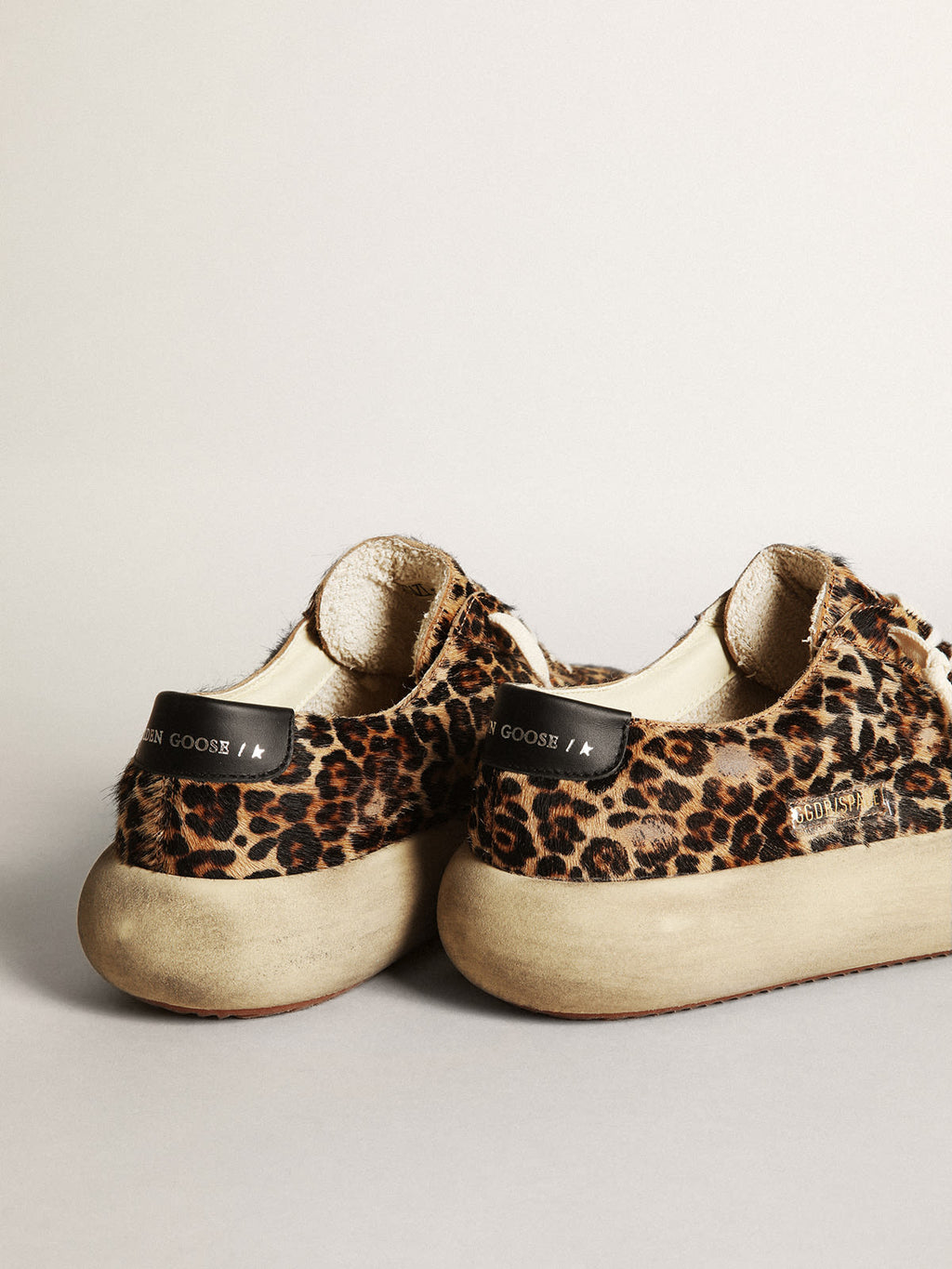 Scarpe Space-Star Uomo in cavallino leopardato con stella e talloncino in pelle nera