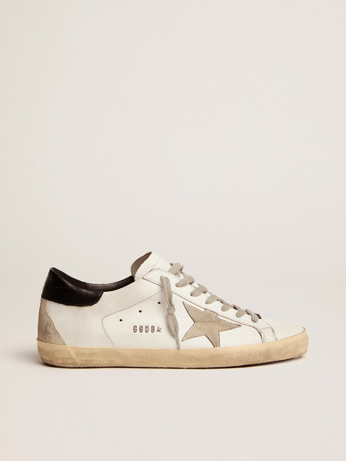 Sneakers Super-Star uomo con talloncino nero e metal studs lettering