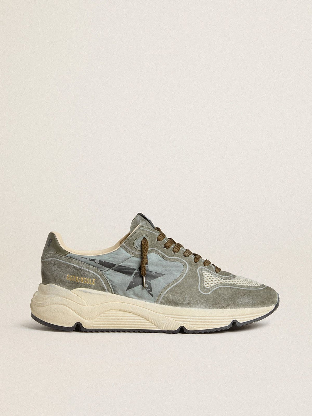 Men's Running Sole in light blue nylon with black star and green leather heel tab