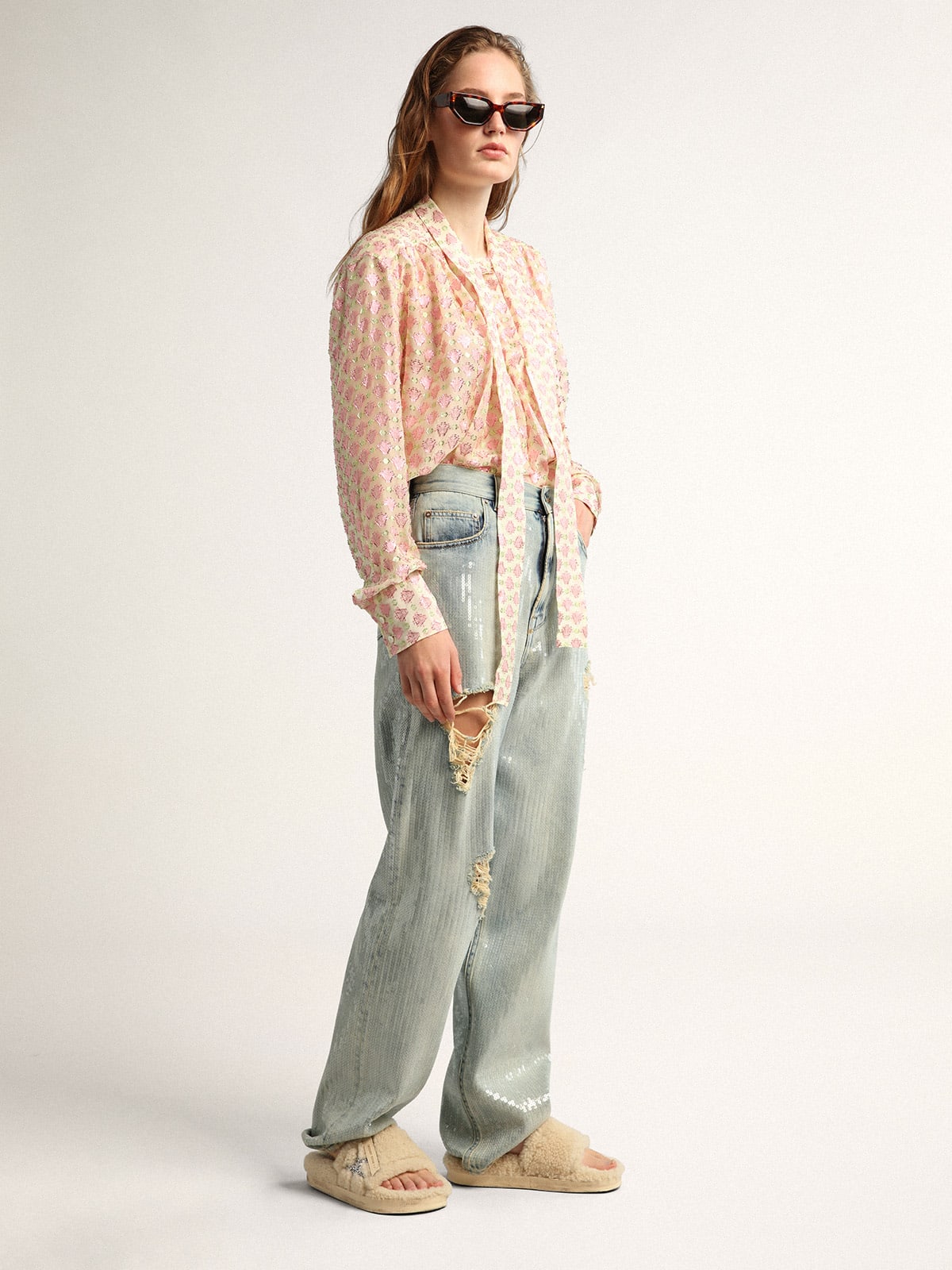 Jeans Collezione Journey di colore blu chiaro dall'effetto distressed con paillettes all-over