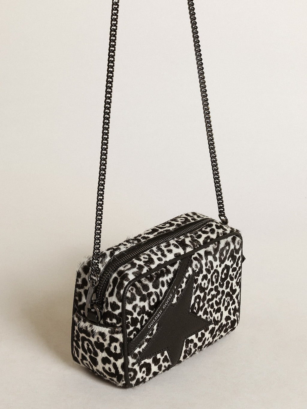Borsa Mini Star Bag in cavallino leopardato color bianco e nero con stella in pelle nera