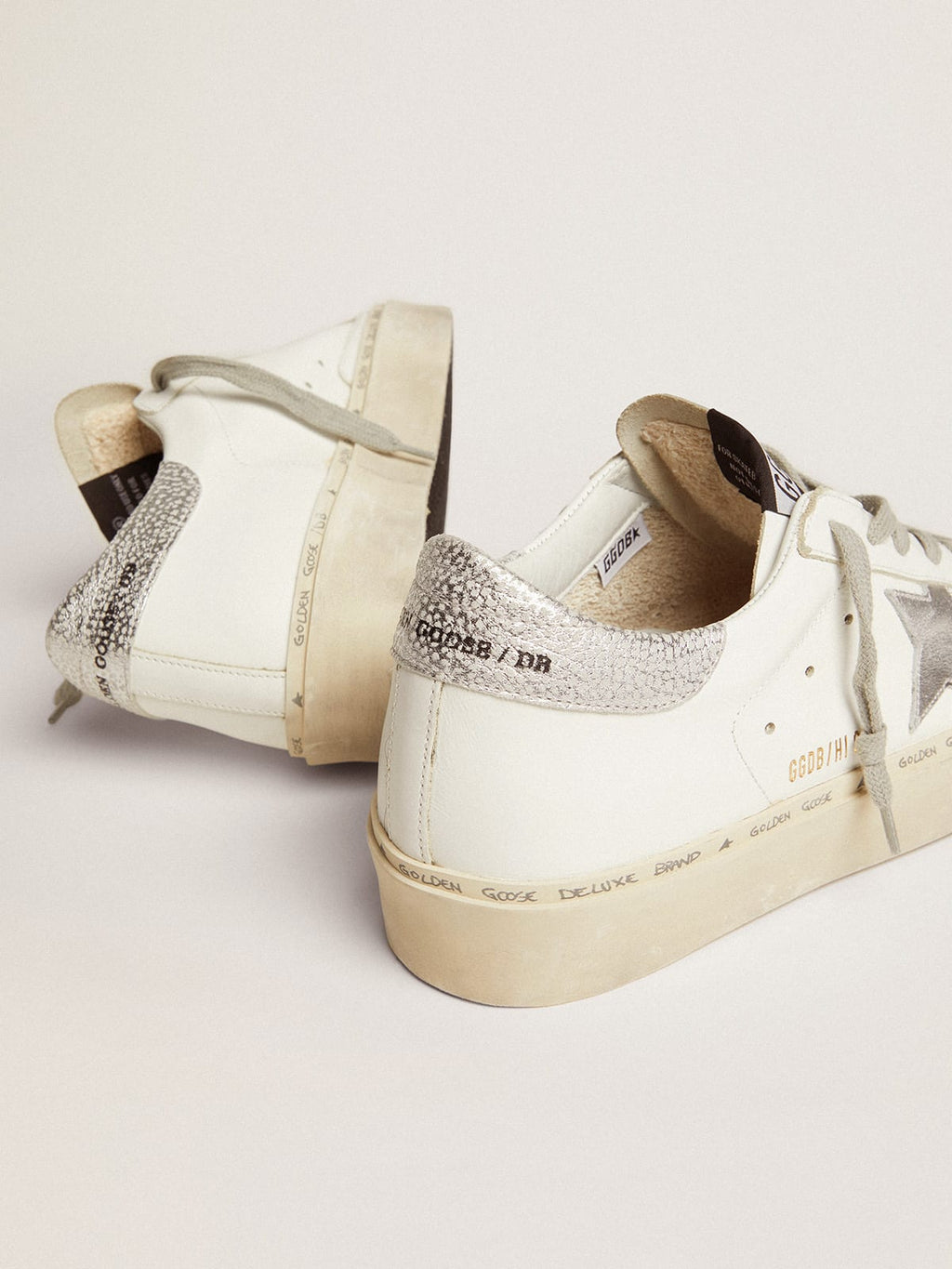 Sneakers Hi Star con stella e talloncino in argento metallizzato