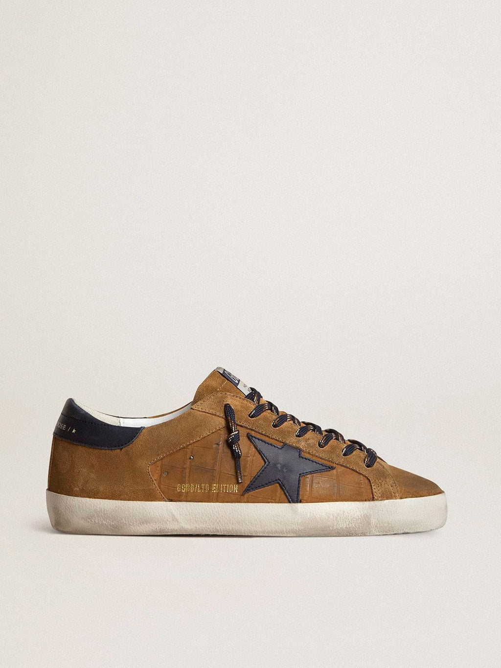 Men's Super-Star LTD in tobacco-colored croc-print leather with midnight blue leather star and heel tab