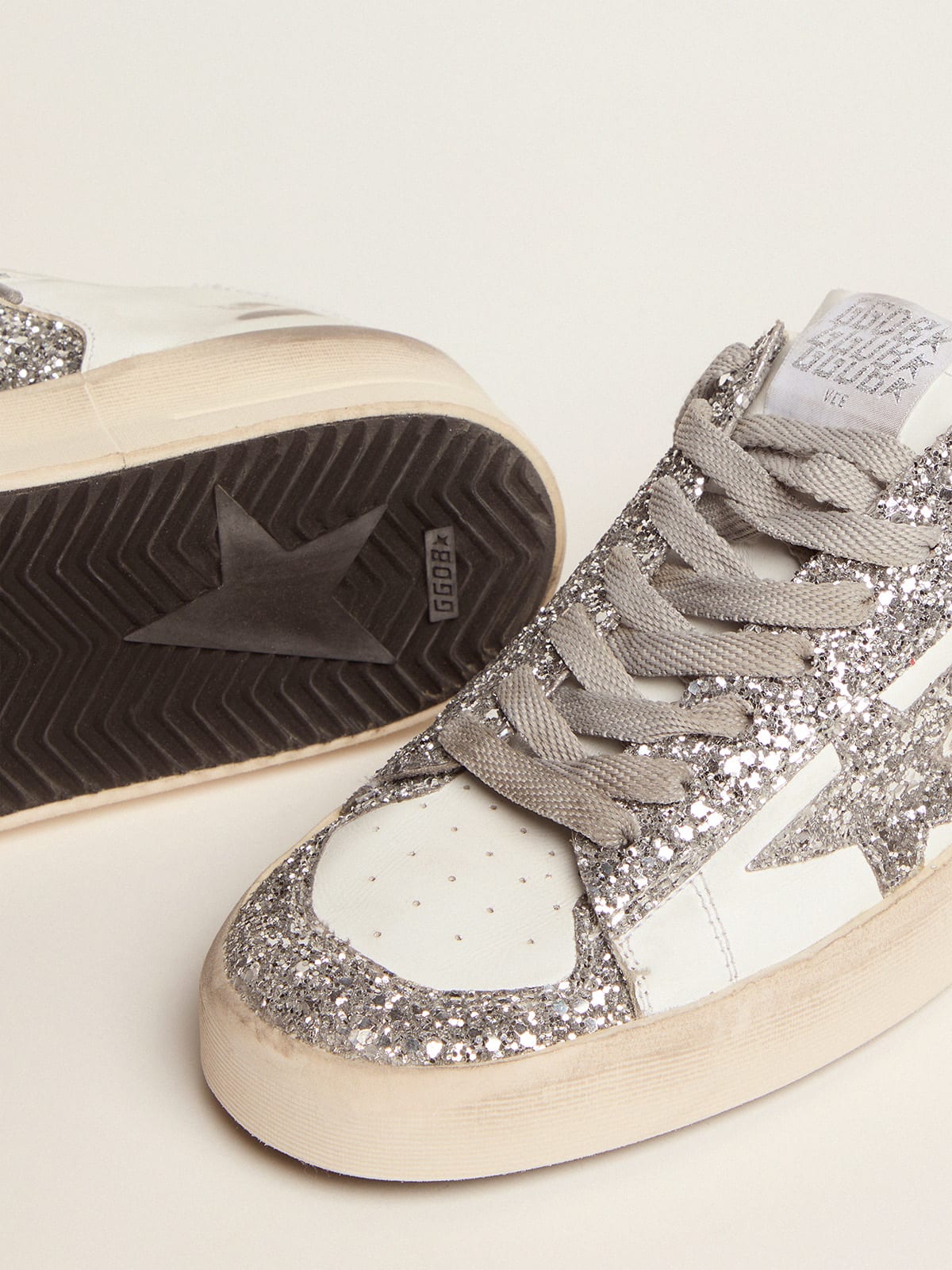 Sneaker Stardan in pelle bianca e glitter argento
