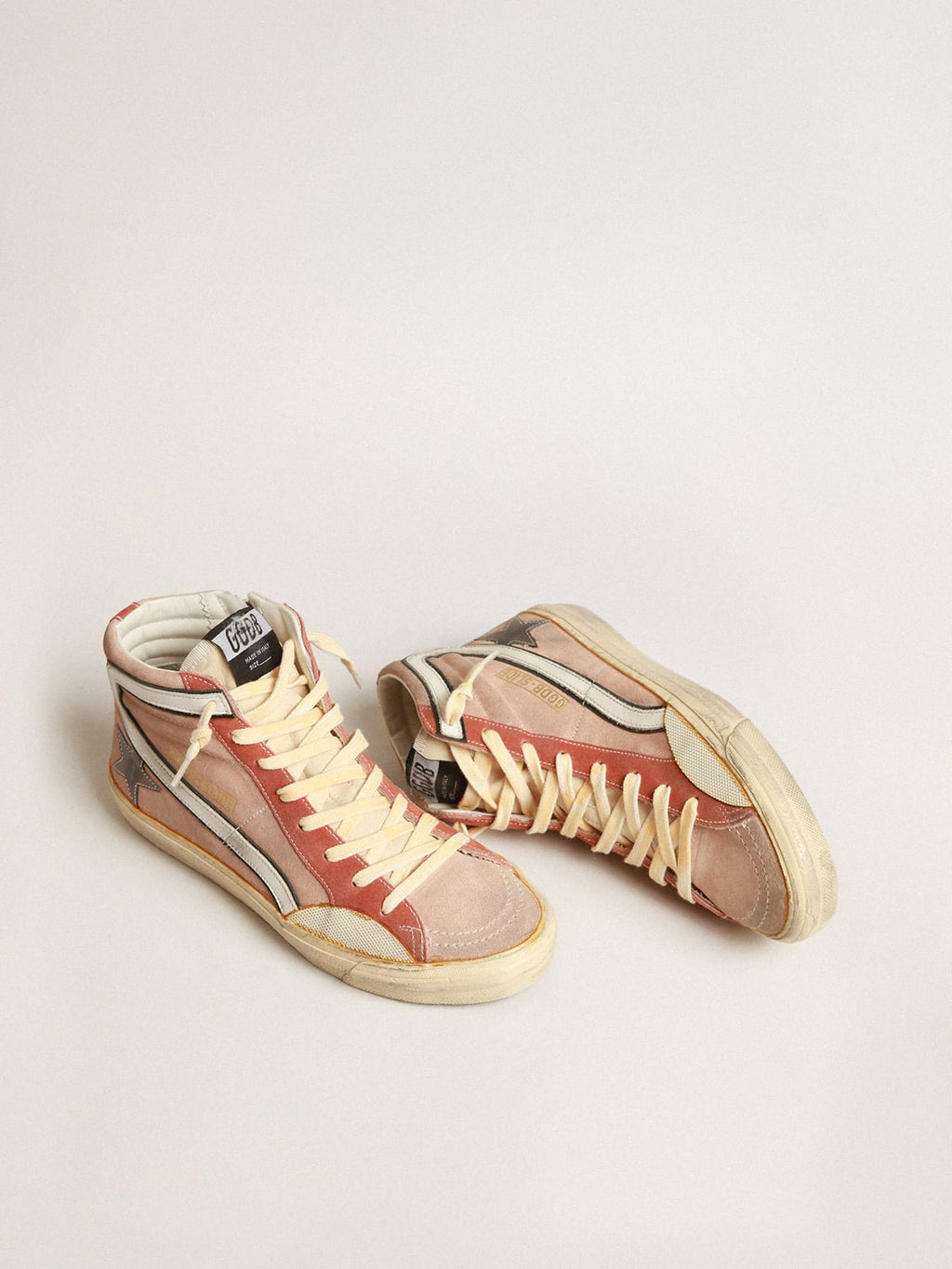 Slide in suede rosa con stella in pelle laminata color antracite