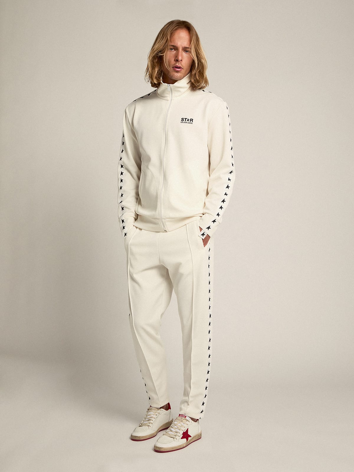Felpa con zip da uomo di colore bianco con nastro bianco e stelle nere