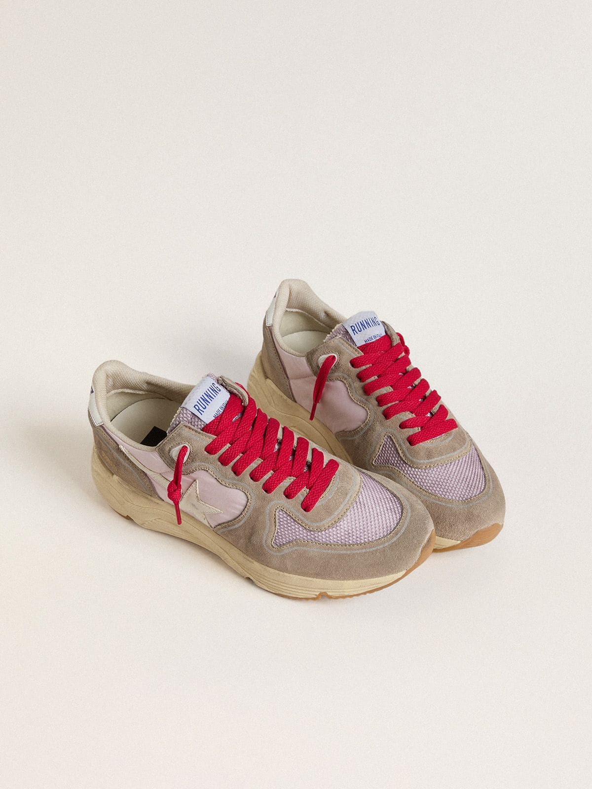 Running Sole LTD in pink nylon with white leather star