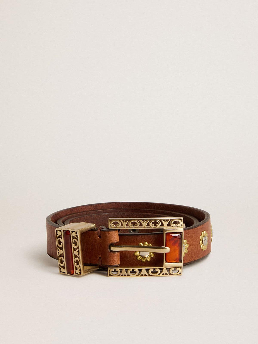Brown leather belt with golden floral studs and amber inserts