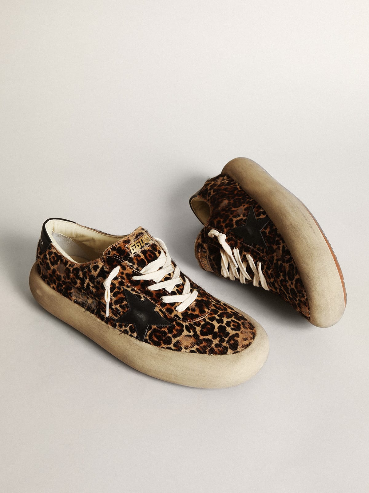 Scarpe Space-Star Uomo in cavallino leopardato con stella e talloncino in pelle nera