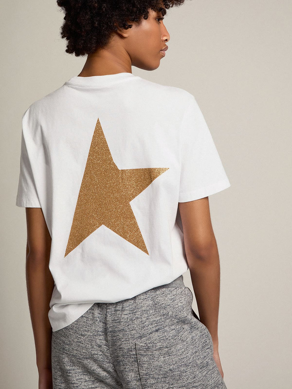 T-shirt bianca Collezion Star con logo e stella in glitter dorati