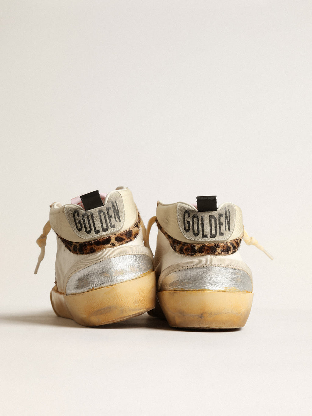 Mid Star LTD con inserti in pelle laminata argento e stella rosa