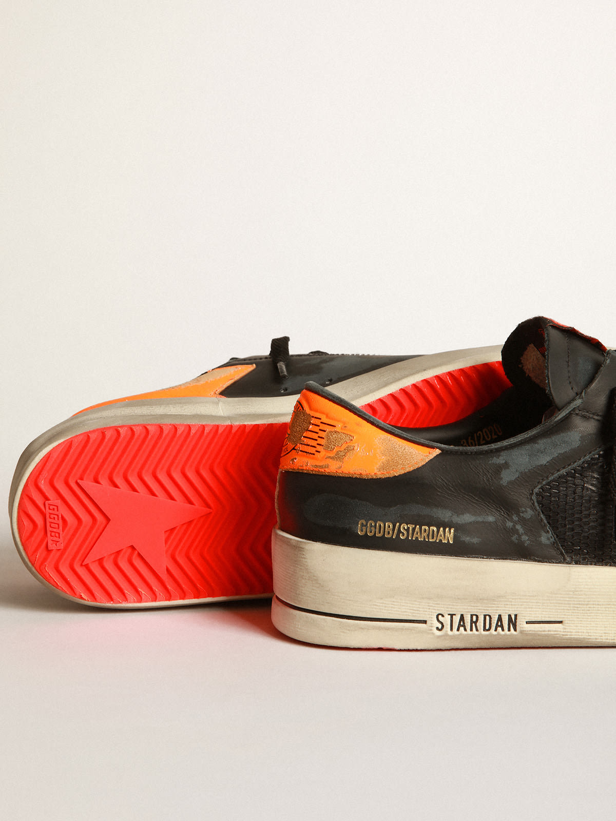 Sneakers Stardan nere e arancioni
