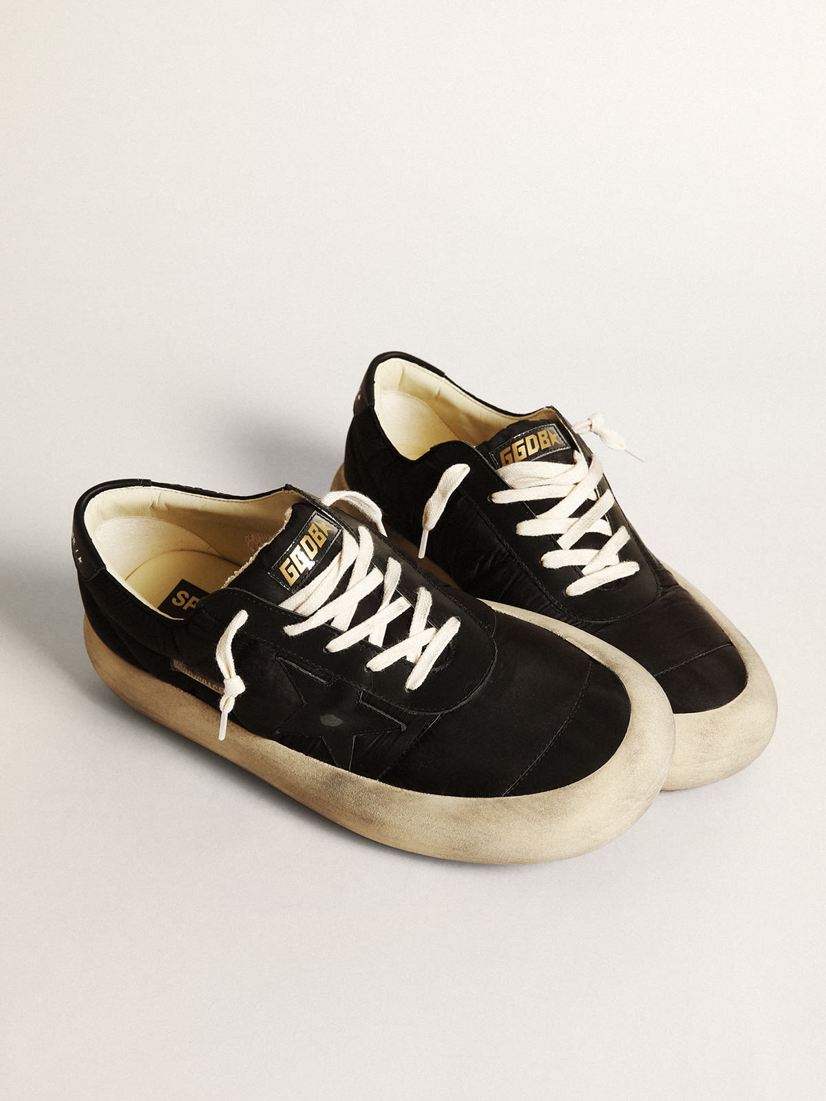 Space-Star Uomo in nylon con stella e talloncino in pelle nera