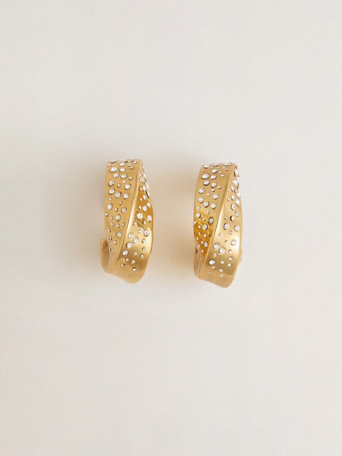 Gold hoop earrings with crystals