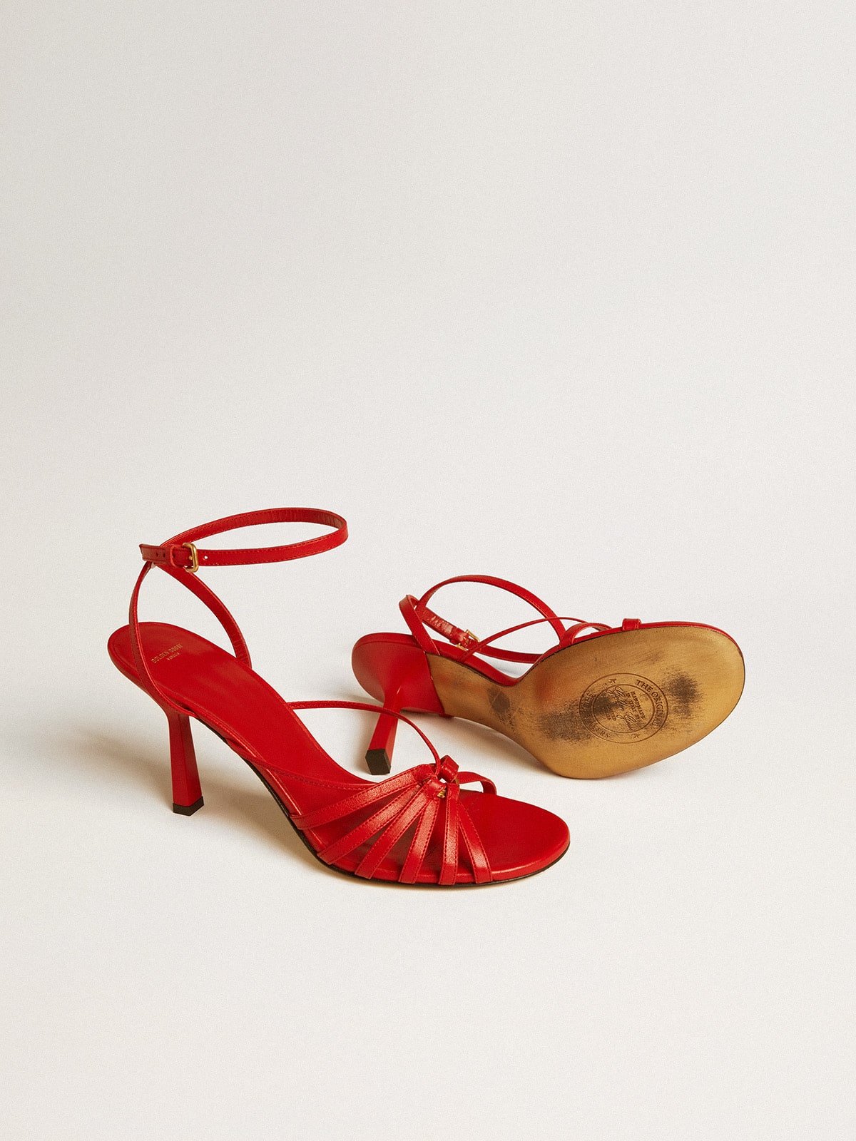 Nico high heel sandals in red nappa leather with gold chain