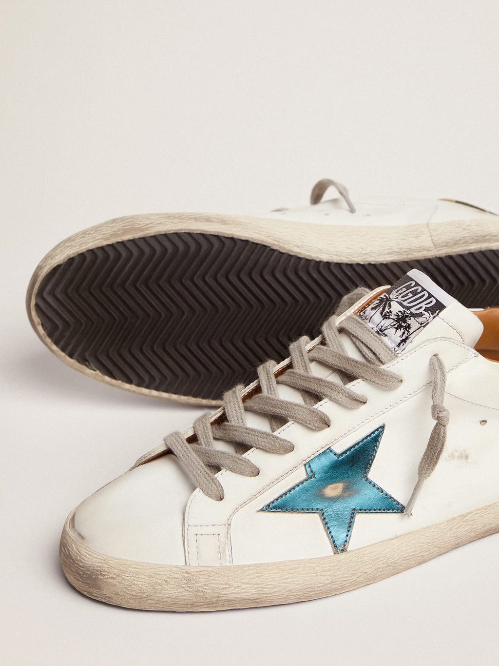 Sneaker Super-Star con stella in pelle laminata blu petrolio e talloncino in tessuto ripstop camou