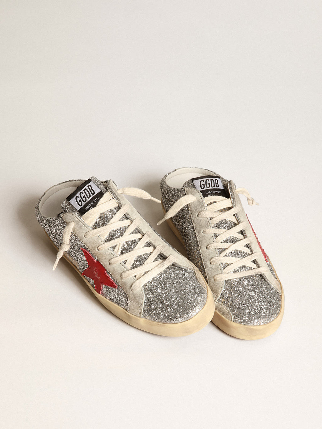 Super-Star Sabot in glitter argento con stella in pelle rossa