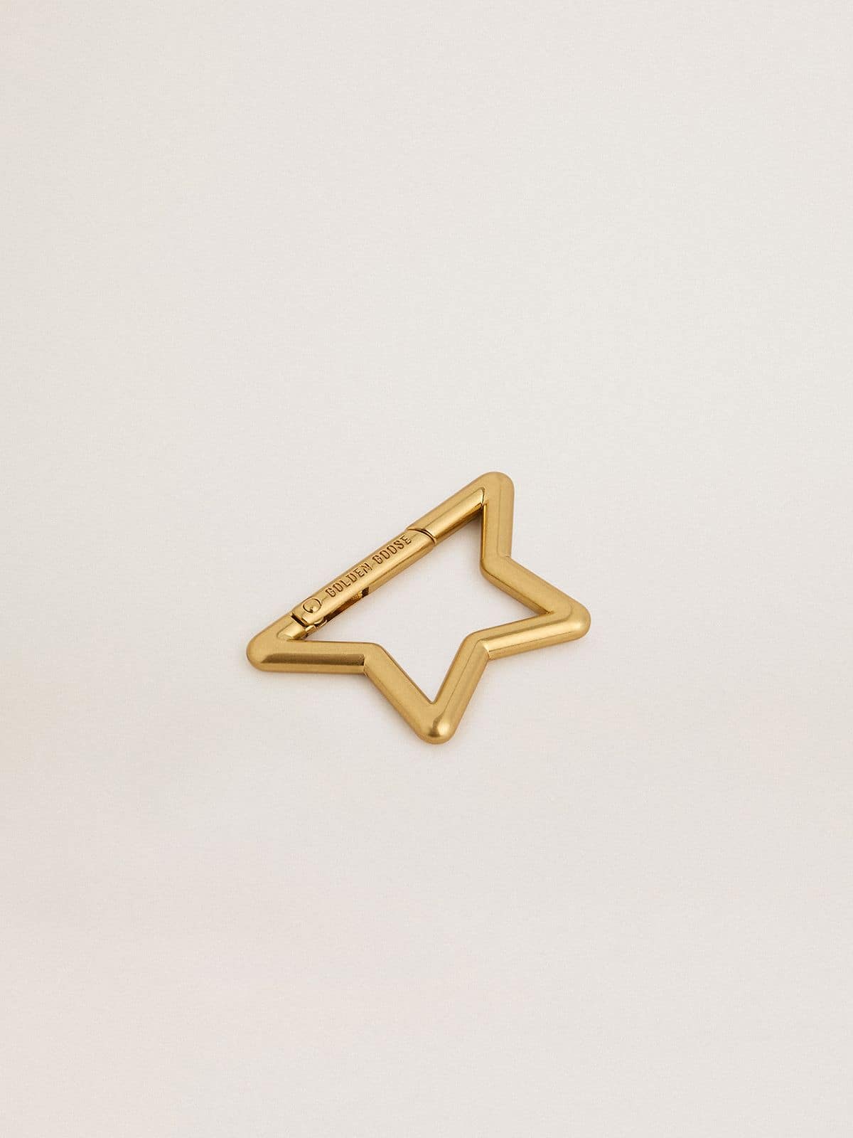 Gold snap hook in the shape of the Golden star