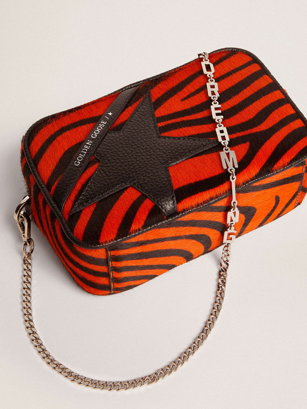 Borsa Mini Star Bag in cavallino tigrato color arancione e stella in pelle nera