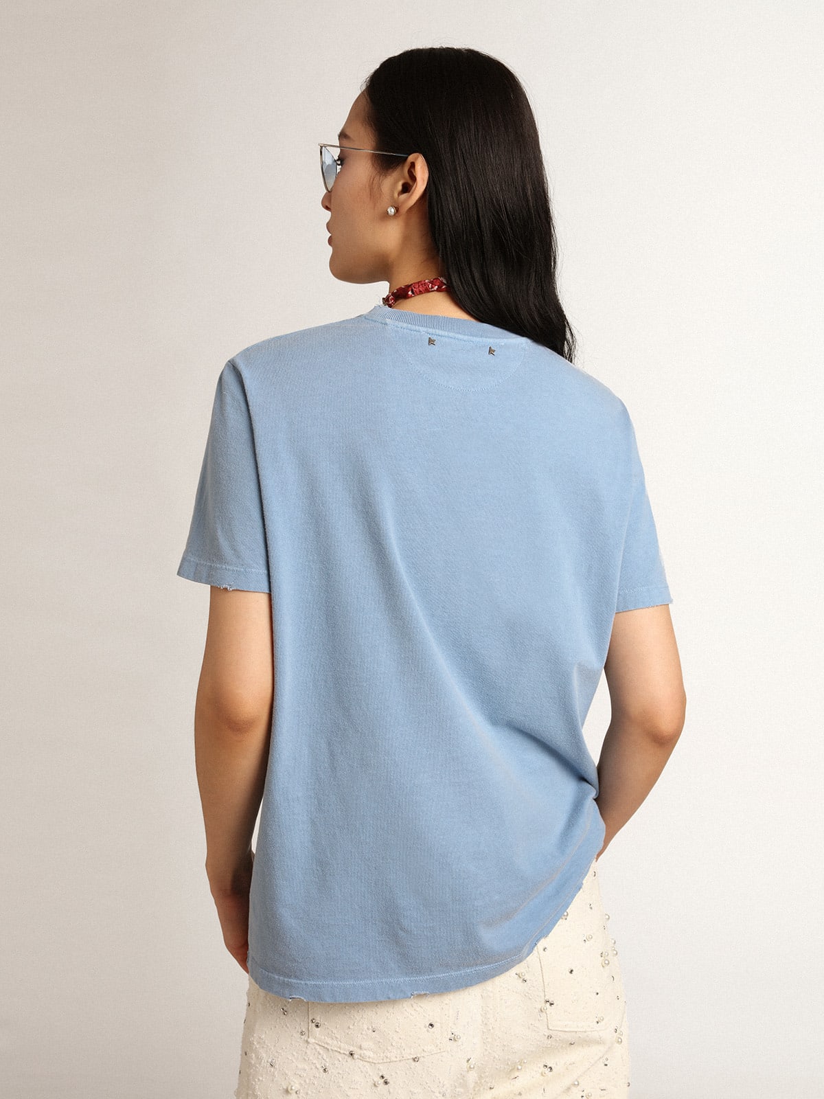 T-shirt Collezione Journey color blu harbor dall'effetto distressed con scritta Golden ton sur ton