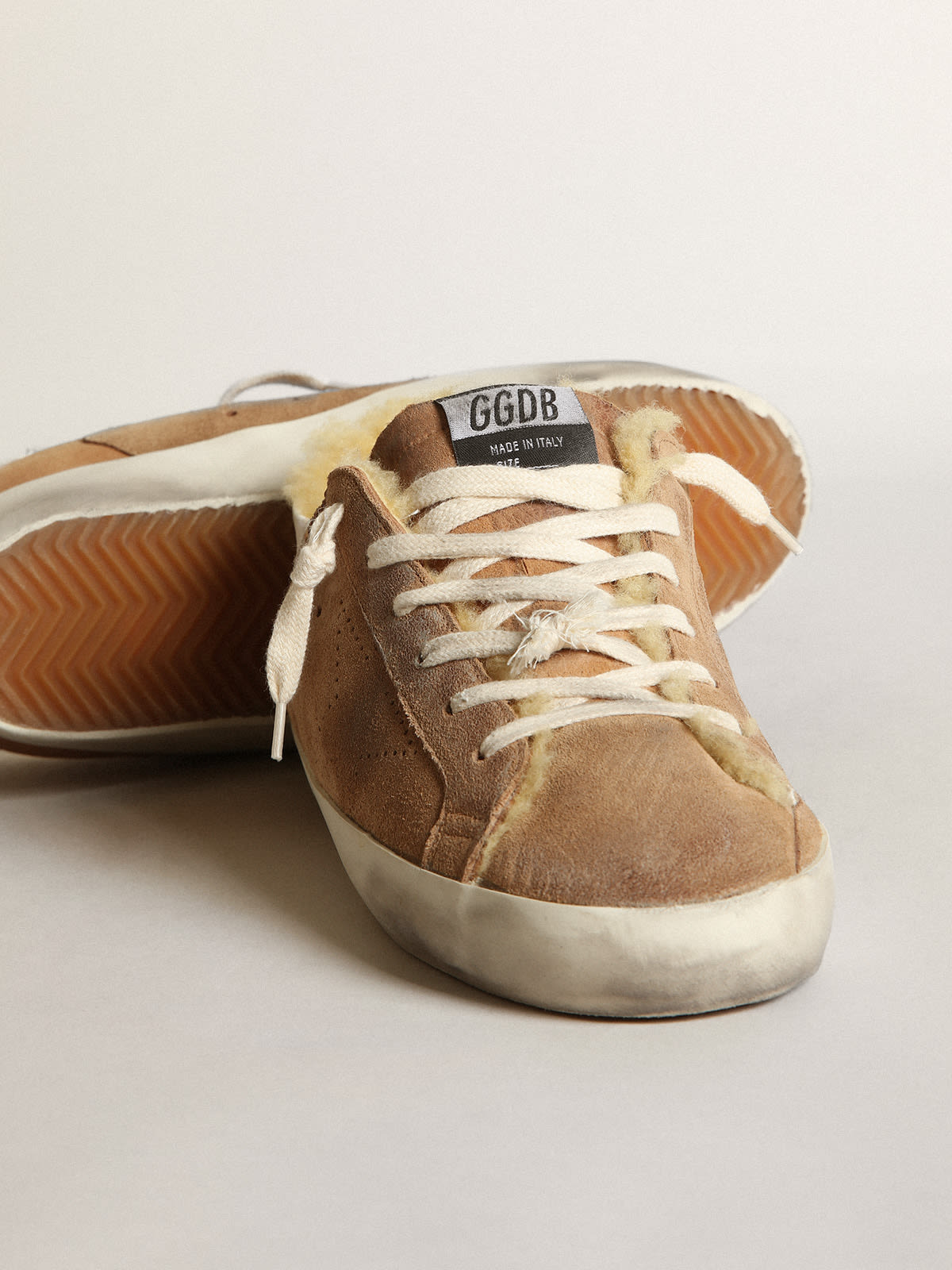 Super-Star LTD con stella traforata e fodera in shearling