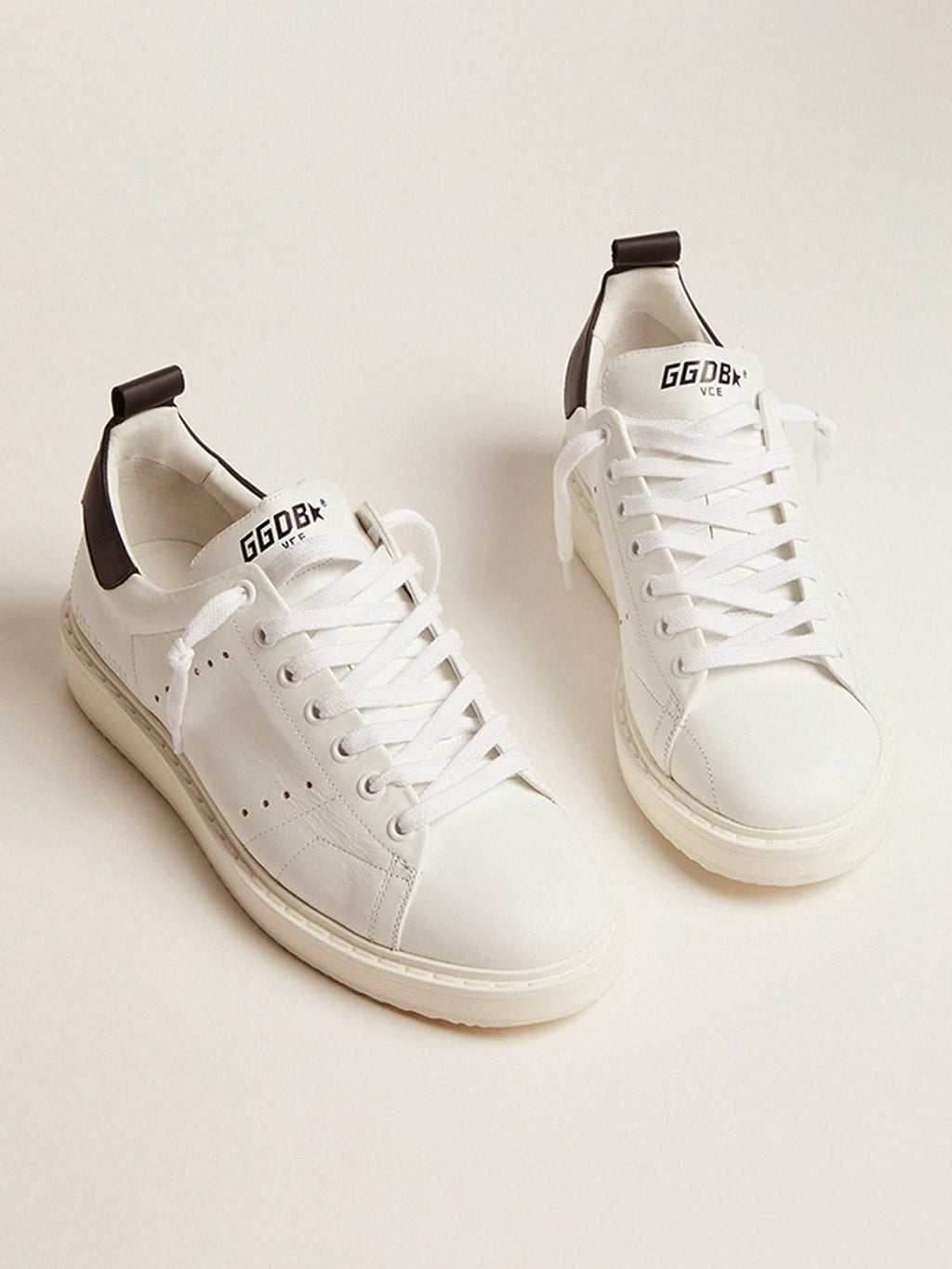 Sneaker Starter in pelle bianca con talloncino in pelle nera