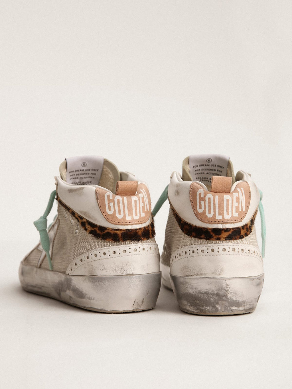 Sneaker Mid Star con stella in pelle laminata color argento e virgola in cavallino leopardato