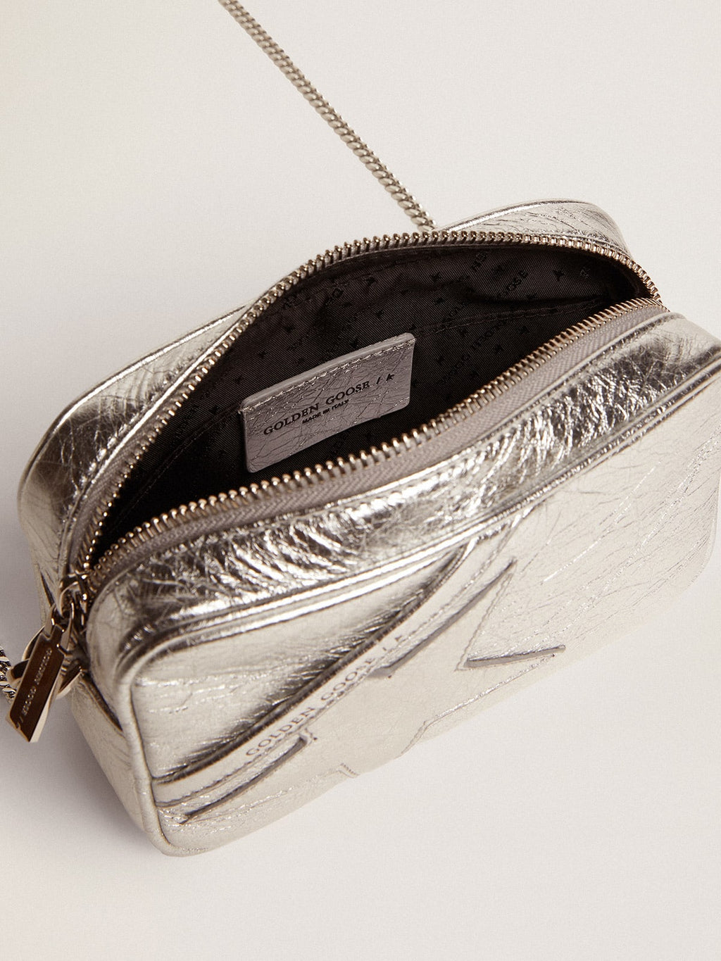 Borsa Mini Star Bag in pelle laminata color argento e stella ton sur ton