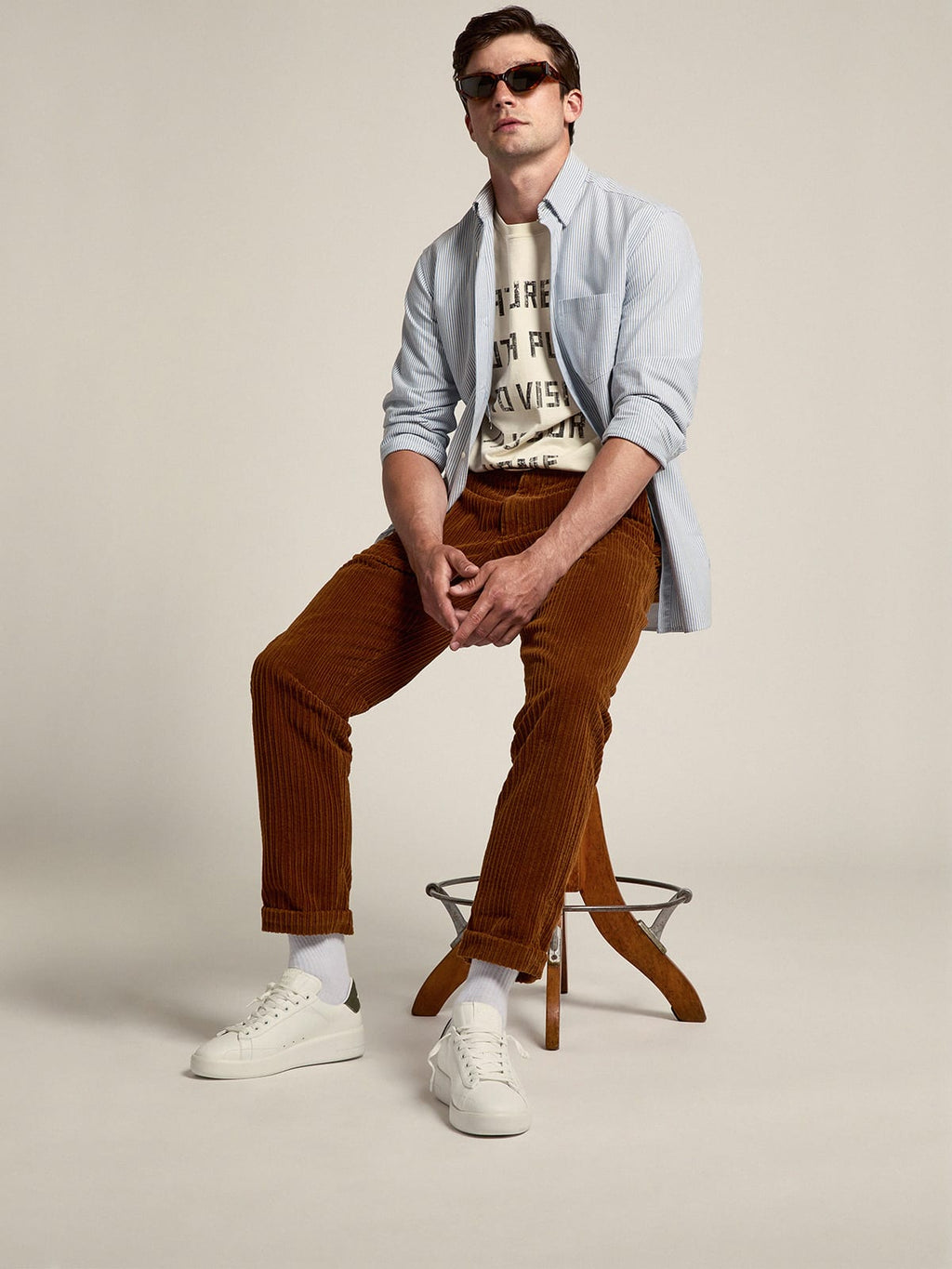 Sneaker Purestar in pelle bianca e talloncino in canvas verde