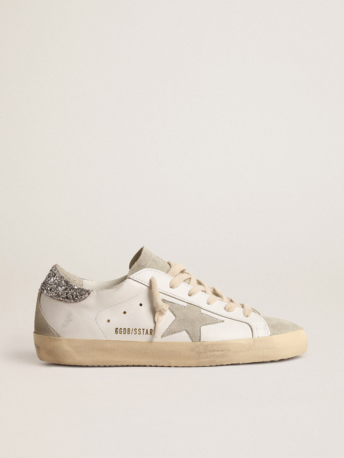 Super-Star con stella grigia e talloncino in glitter argento