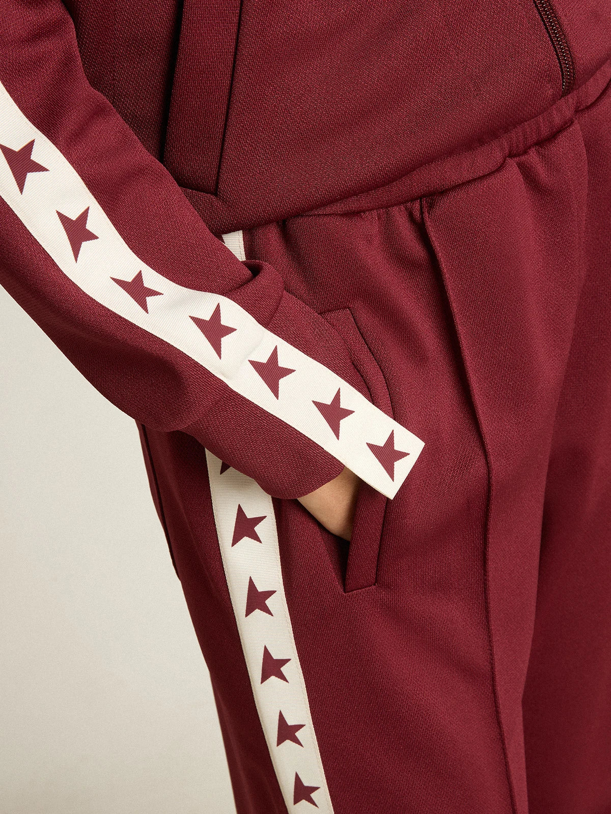 Pantalone jogging da donna di colore bordeaux con stelle sui lati