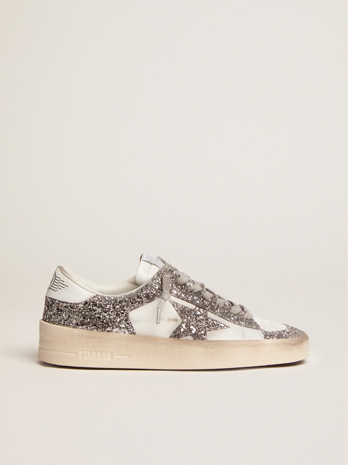 Sneaker Stardan in pelle bianca e glitter argento