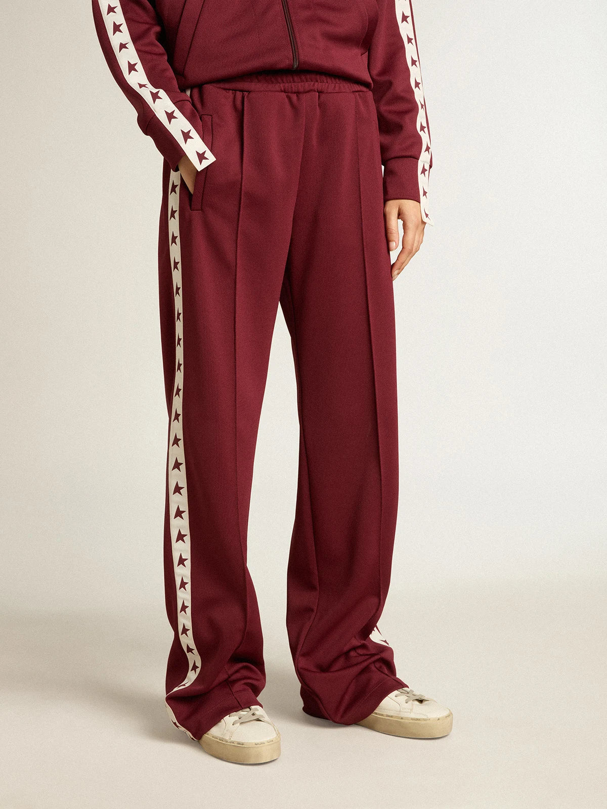 Pantalone jogging da donna di colore bordeaux con stelle sui lati