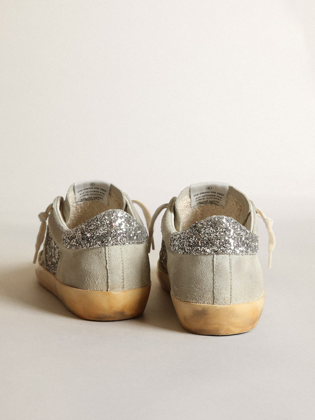 Sneaker Super-Star in glitter argento con stella e inserti in suede color grigio ghiaccio