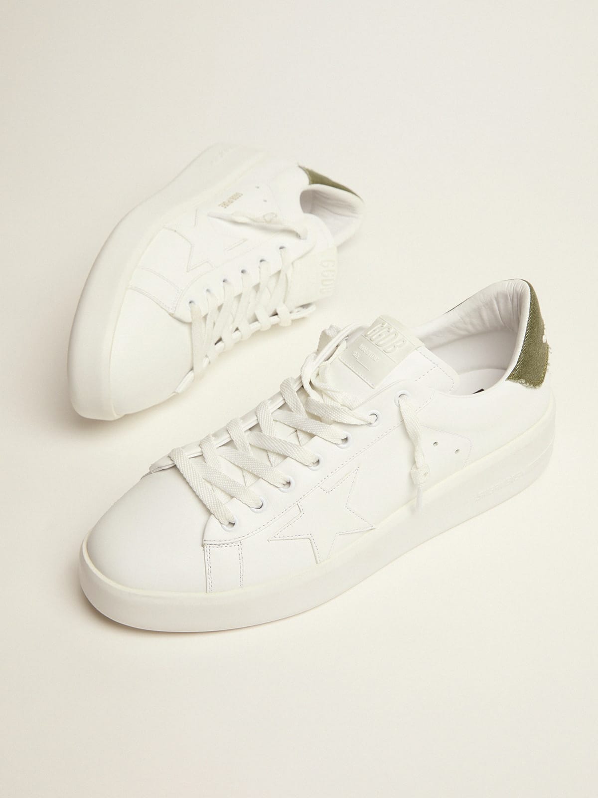Sneaker Purestar in pelle bianca e talloncino in canvas verde