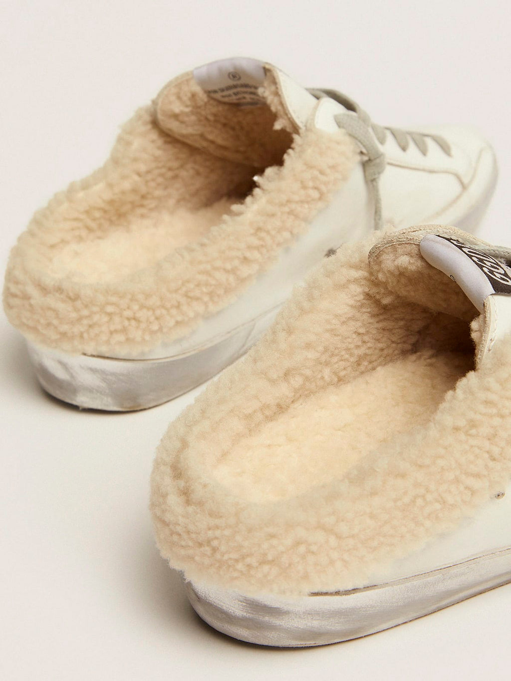 Super-Star Sabot in pelle bianca e fodera in shearling