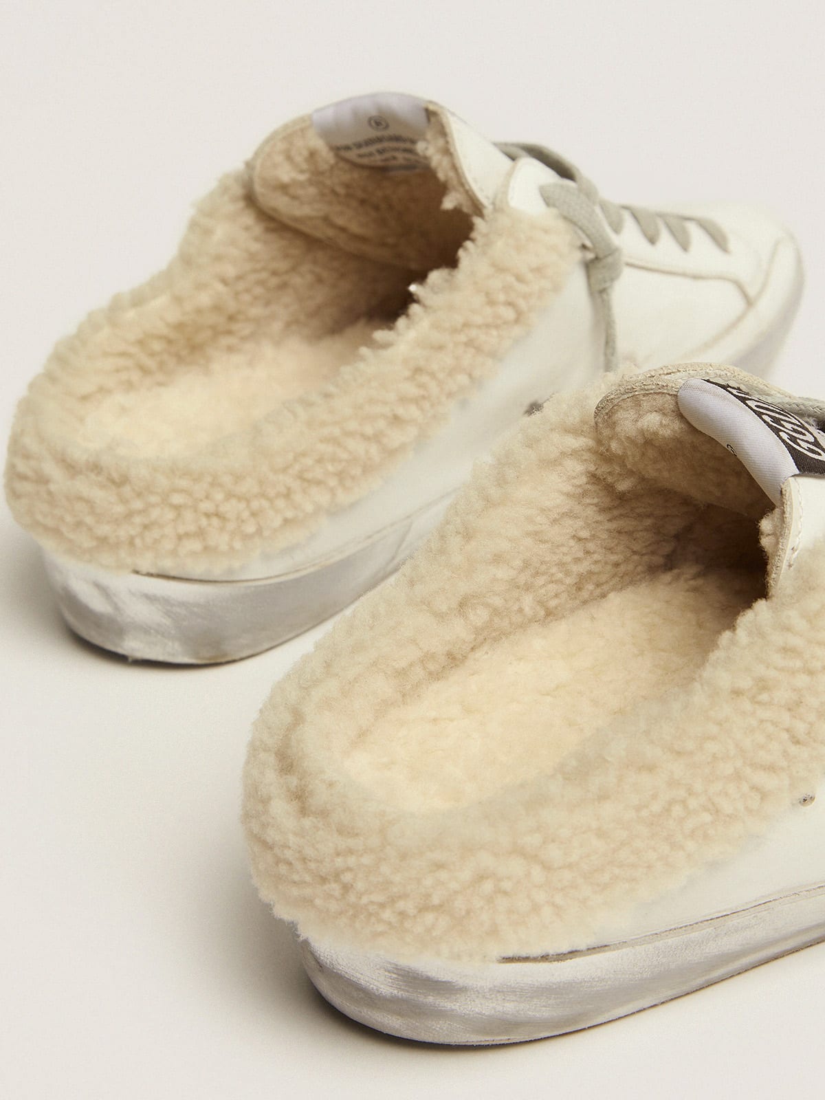 Super-Star Sabot in pelle bianca e fodera in shearling