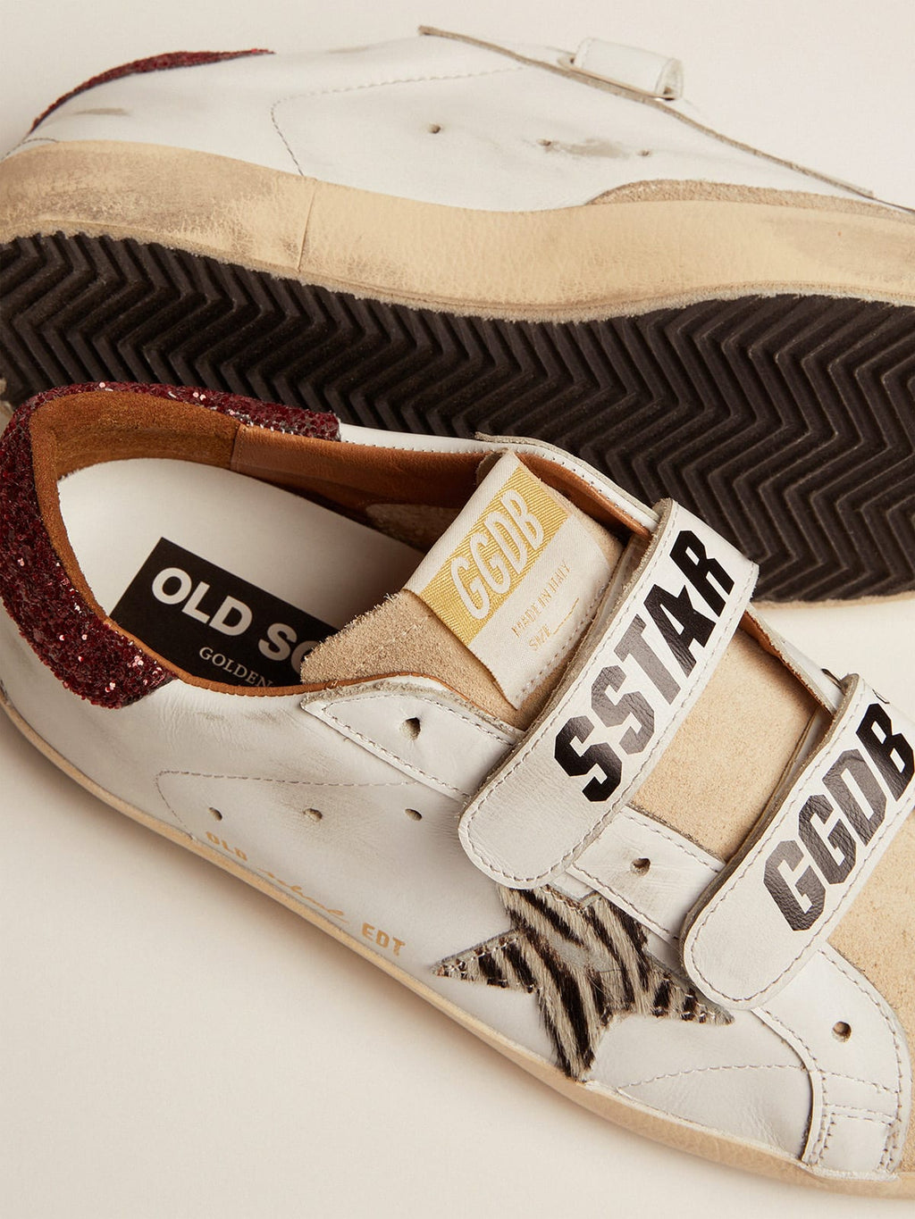 Sneaker Old School con stella in cavallino zebrato e talloncino in glitter rossi