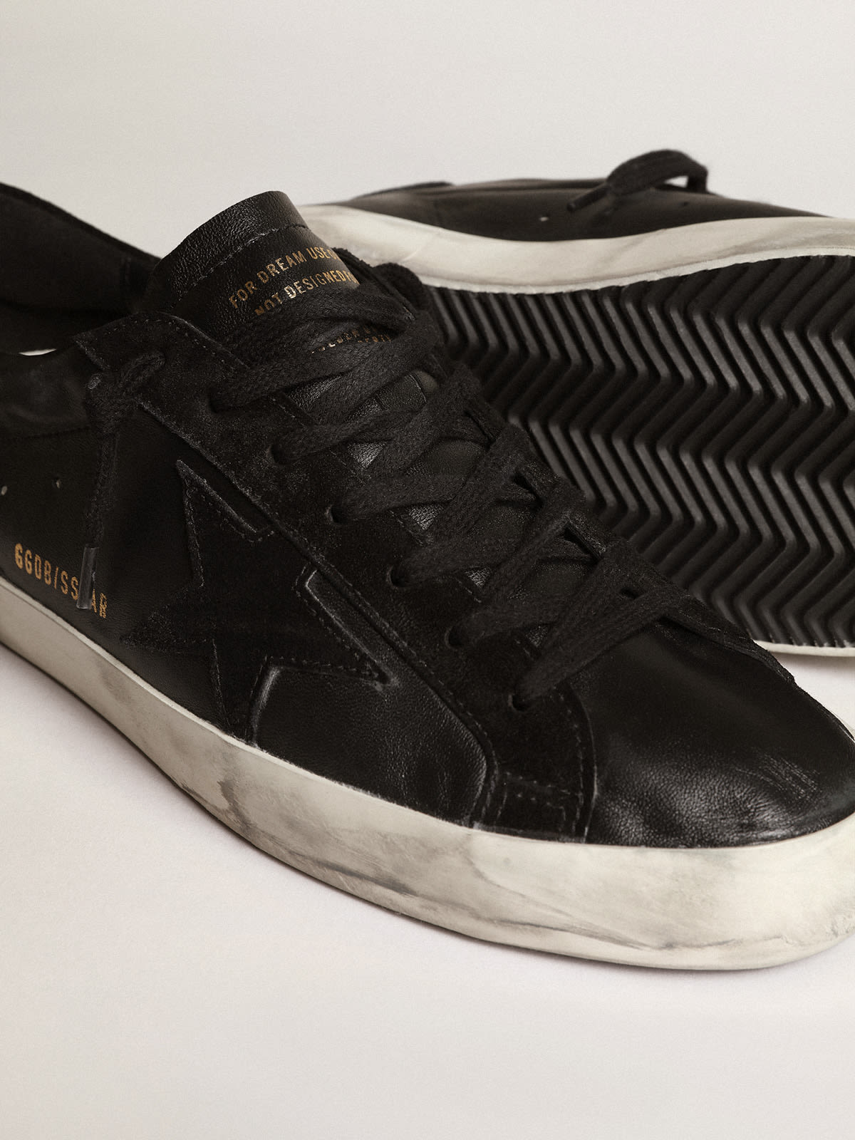 Super-Star in nappa nera con stella e talloncino in suede nero