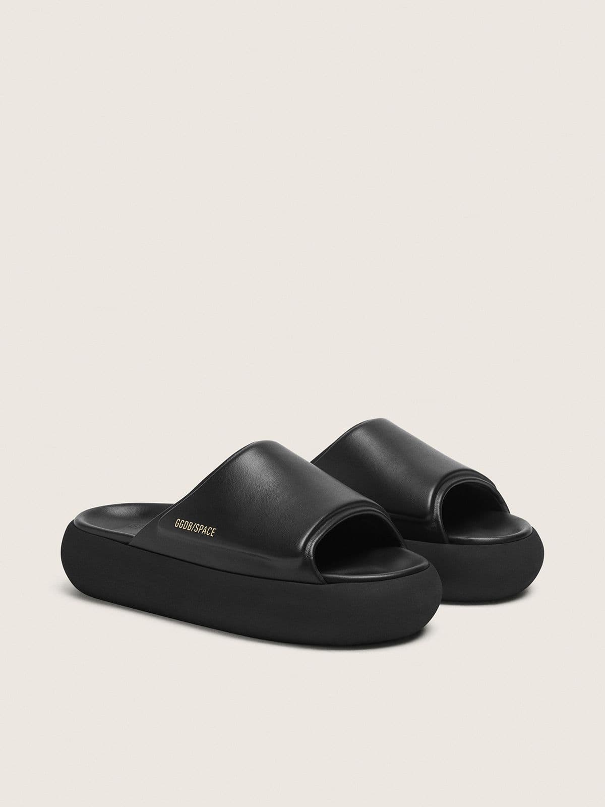 Women's Space-Star Slide slip-ons in black leather