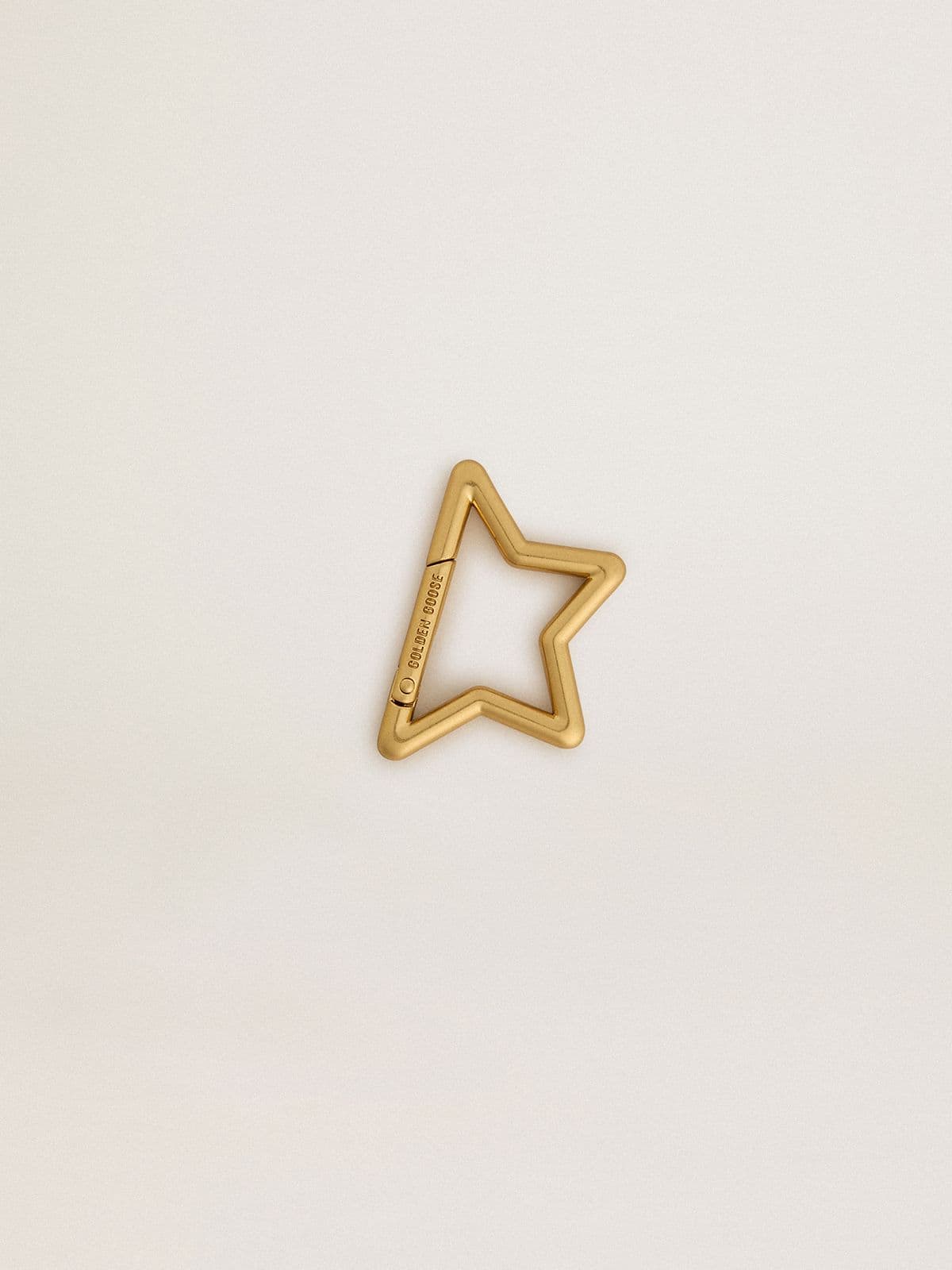 Gold snap hook in the shape of the Golden star
