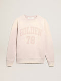 Felpa color rosa pallido dal trattamento distressed