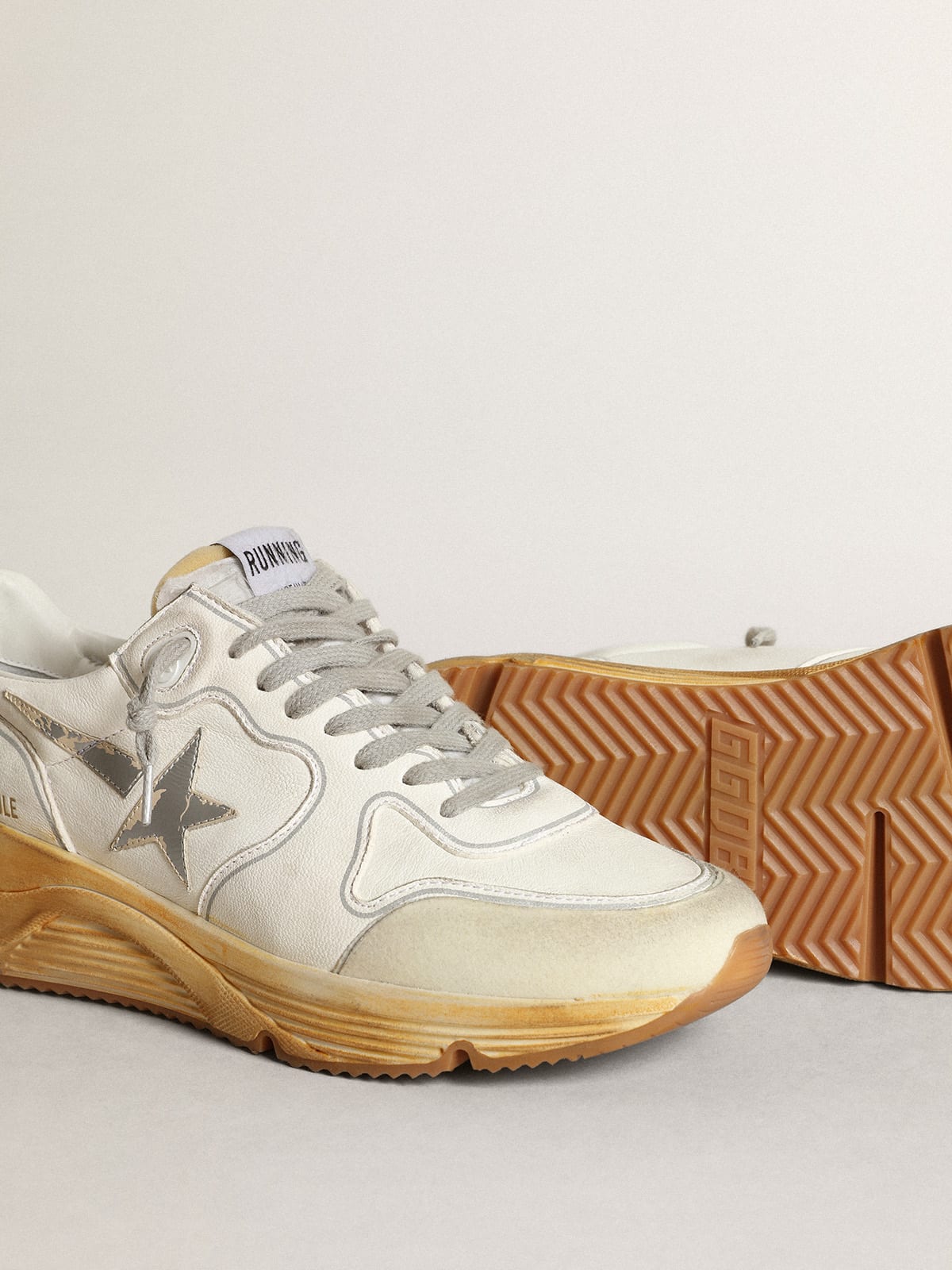 Sneaker Running Sole con stella e talloncino in pelle con stampa digitale color argento