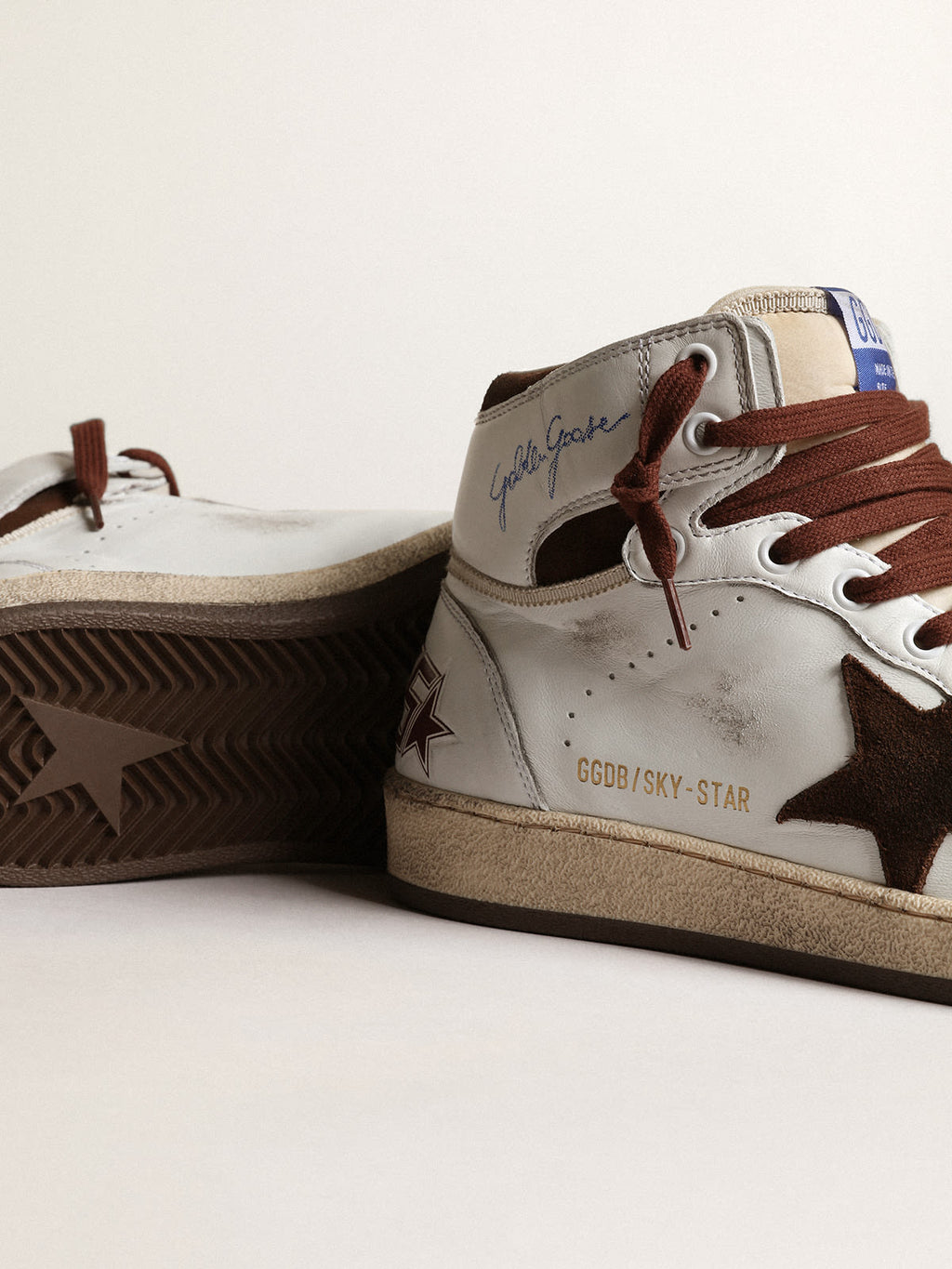 Sky-Star Donna in nappa bianca con stella in suede cioccolato